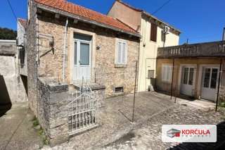  A charming stone house in the center of Blat is for sale