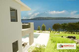 Building plot with project and building permit in the second row to the sea in Prižba